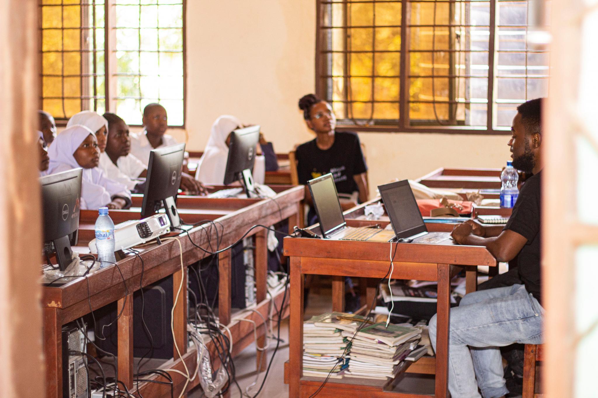 Our local partner Catherine Kimambo connecting schools